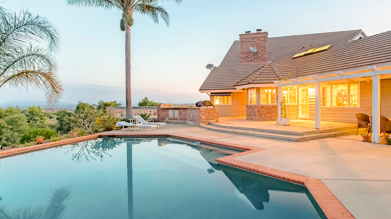 gorgeous pool house with lighting