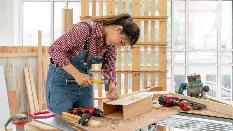 Lady doing woodwork