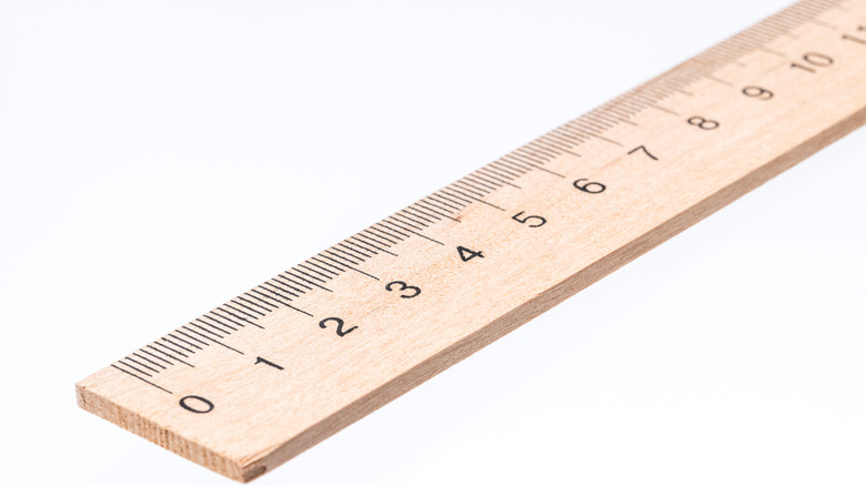 wooden ruler on white background