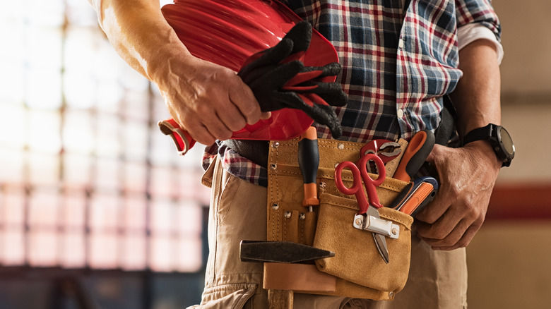 Person wearing a toolbelt