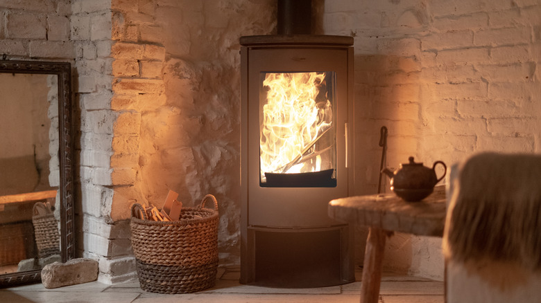 hygge room with stove fire