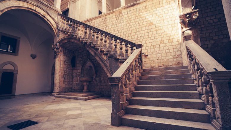 Grand stairway inside medieval castle