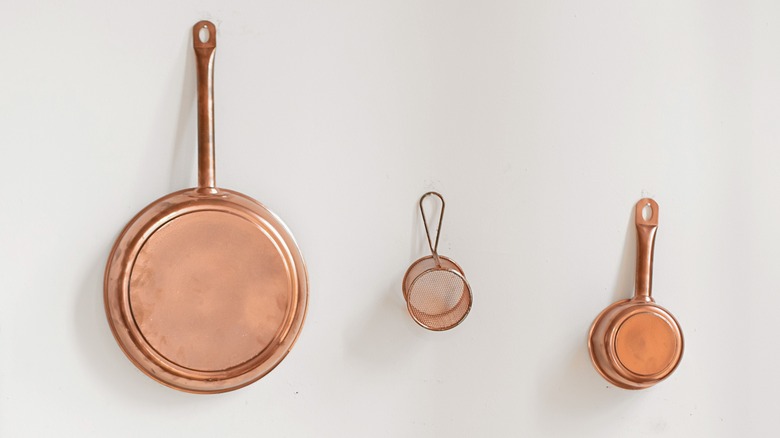 Pans on wall