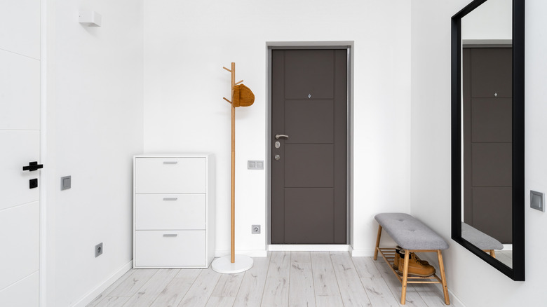 neutral entryway with coat tree