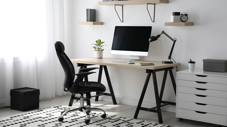 Home office with white wall