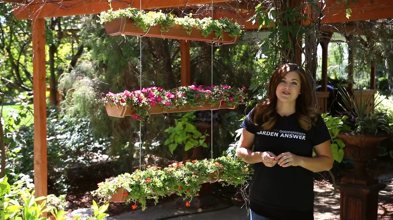 Hanging rain gutter planter