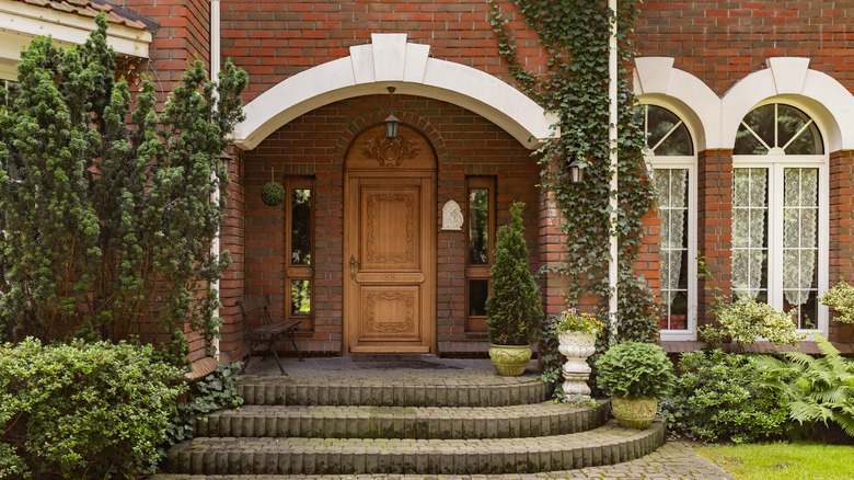 arched front door and windows