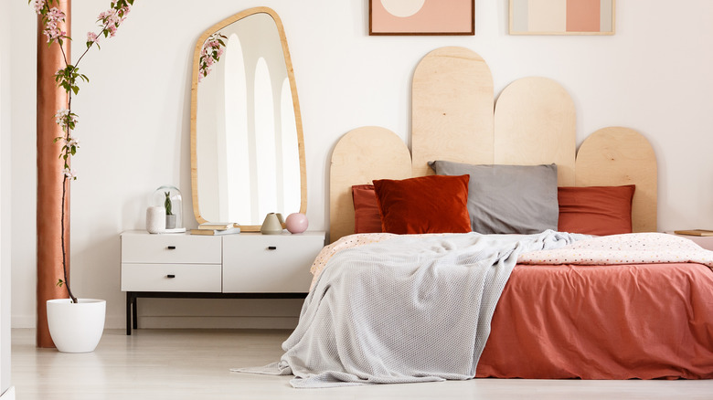 Bed with plywood headboard