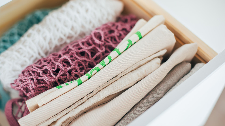 Folded reusable bags in drawer