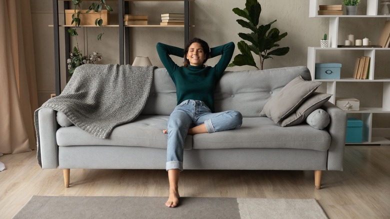 happy woman on couch