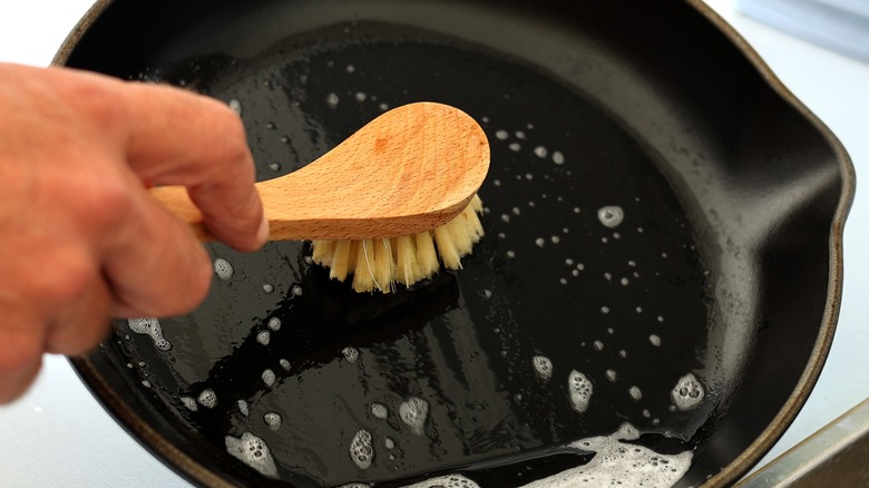Cleaning with soap and brush