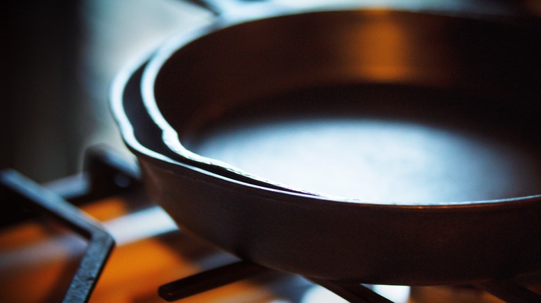 Well-seasoned pans on grill