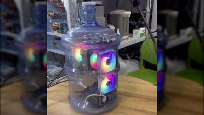 Photo of a PC setup in a 5 gallon water jug