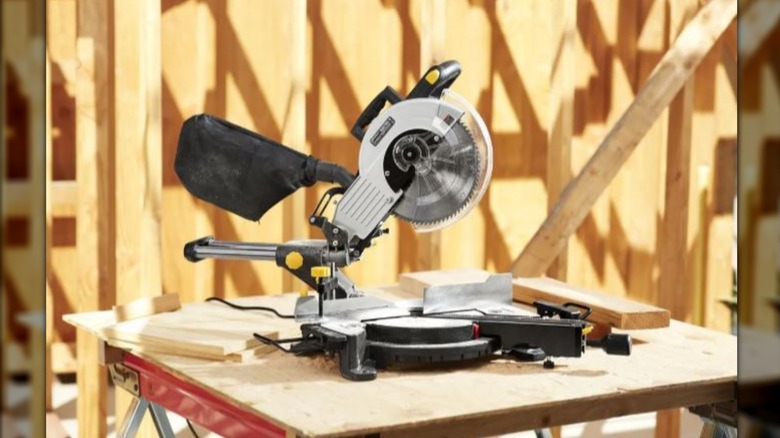 The Chicago Electric Power Tools 10-inch sliding compound miter saw on a work bench