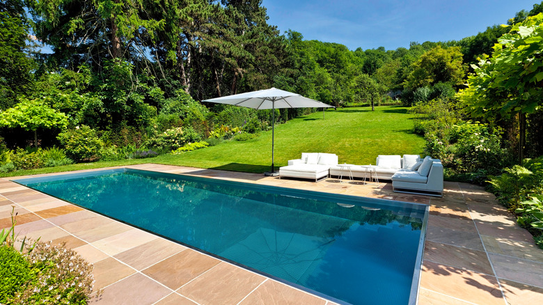 pool with well kept garden