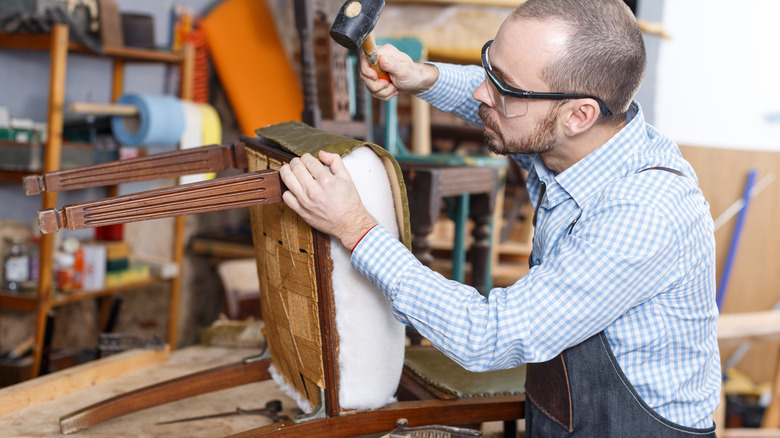 Person rebuilding furniture