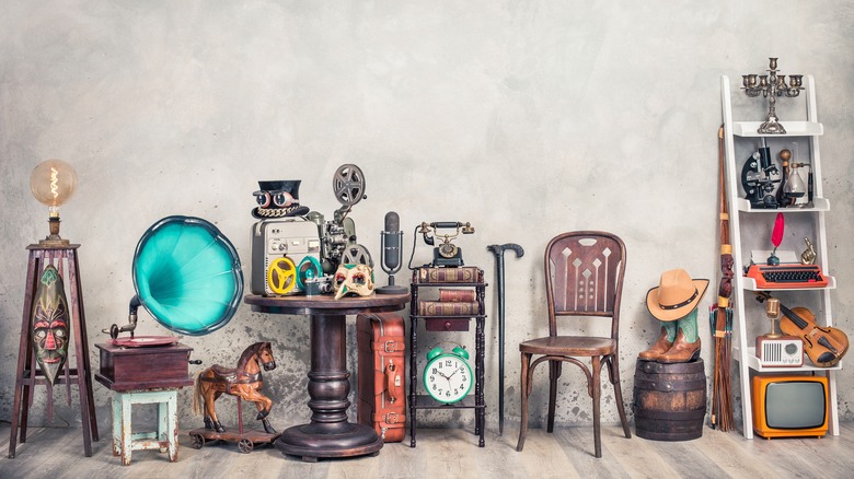 Antiques against gray wall background