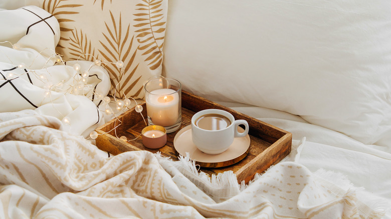 Coffee cup on wooden tray