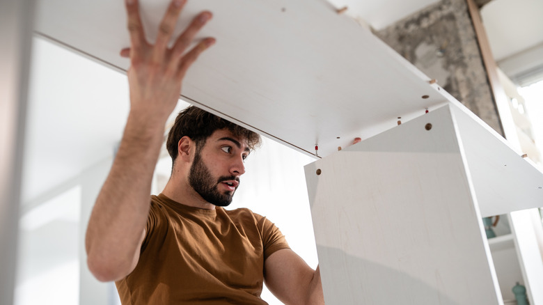 man working on DIY