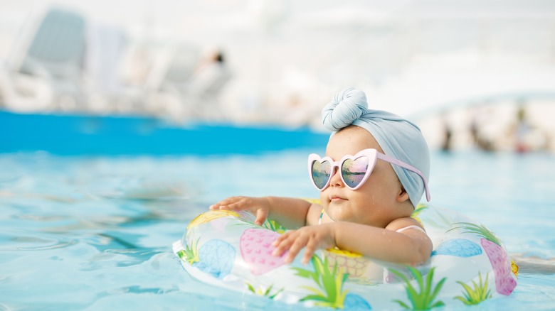 a baby in a pool