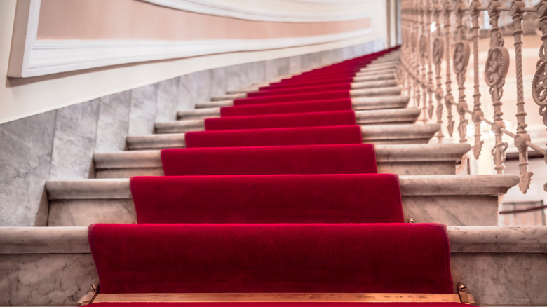 Carpet-covered marble staircase