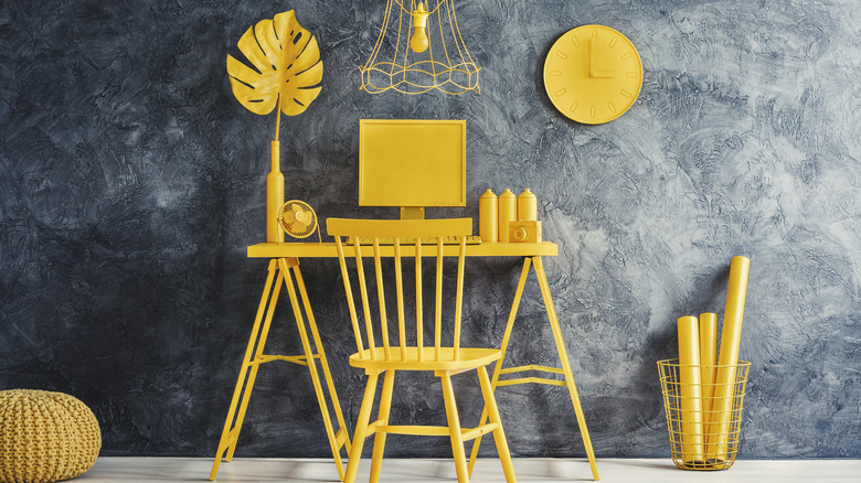neon desk on gray wall
