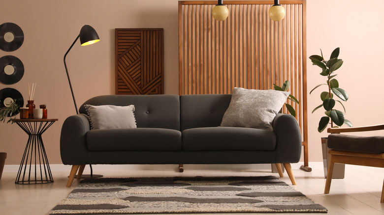 modern sofa over rug