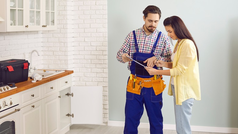 handyman talking to client
