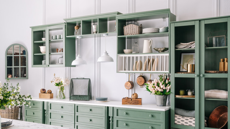 Green organized cabinets