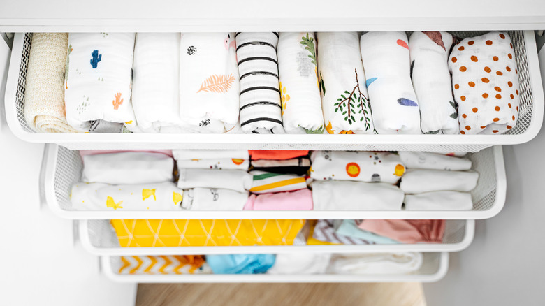 Neatly folded baby clothes