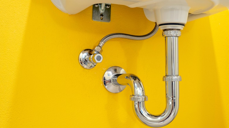 drainpipe beneath sink