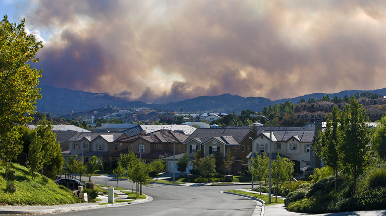 Dense smoke looming over a Los Angeles suburb
