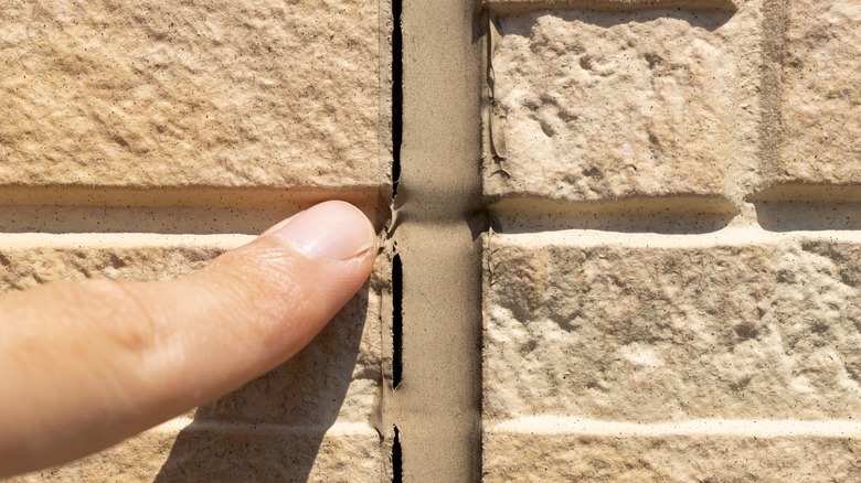 cracking caulk on bricks