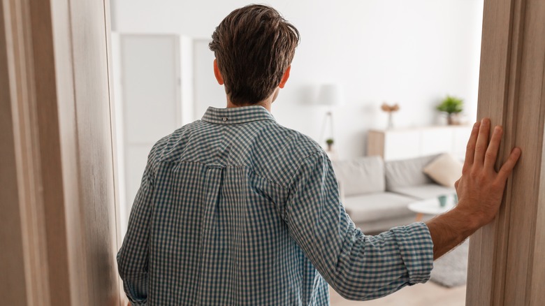 Person standing in doorway