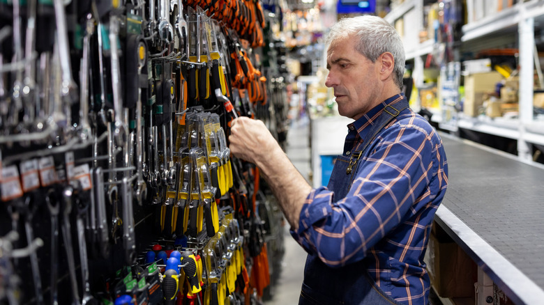 Person shopping for tools