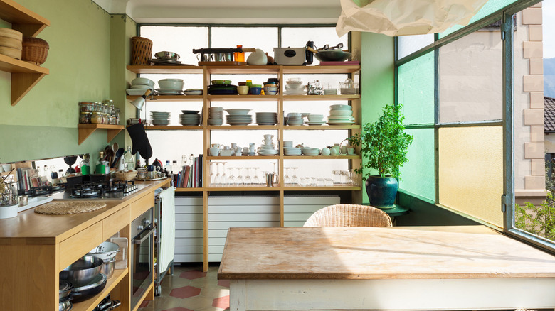Green and wood toned kitchen
