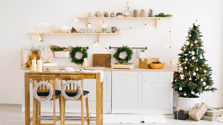 decorated shelves behind dining table