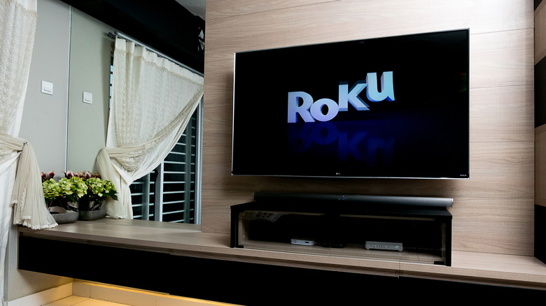 A television with a Roku logo on the screen