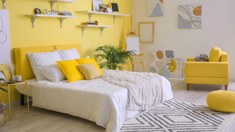 White and bright yellow bedroom