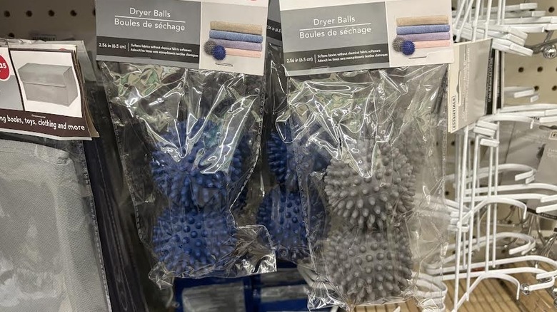 Dollar Tree dryer balls hanging in package in laundry department section