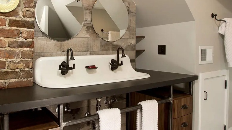 Recycled paper composite countertop in a rustic bathroom