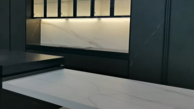 Sintered stone kitchen island in modern showroom