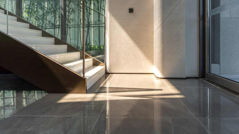 A close-up of a stairwell and a polished concrete floor