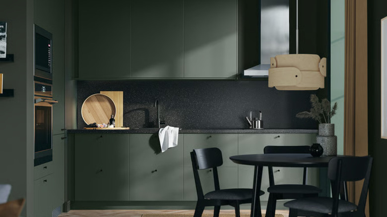 kitchen with deep green IKEA HAVSTORP cabinet fronts