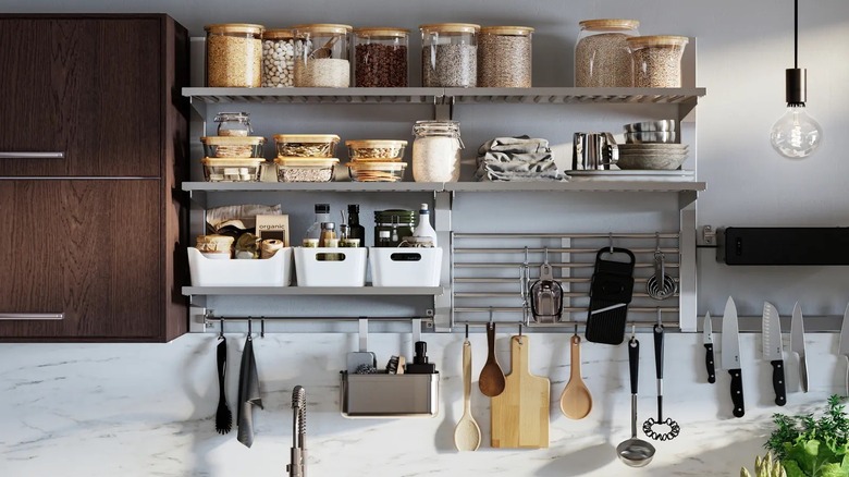 An IKEA KUNGSFORS kitchen with suspension rail storage