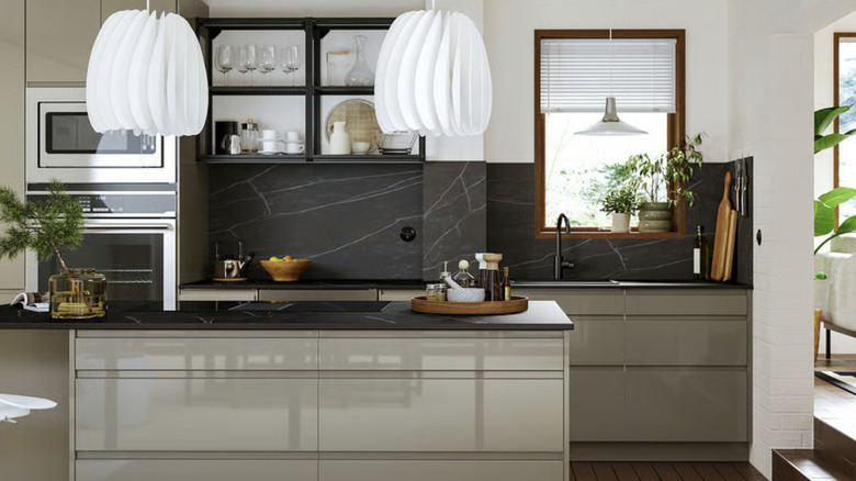 A SEKTION IKEA kitchen with grey brown glossy cabinets