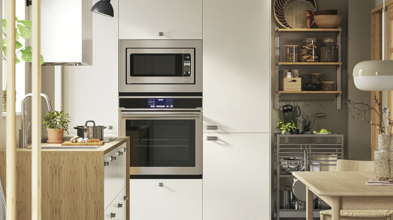 IKEA VEDDINGE white cabinet fronts with silver hardware
