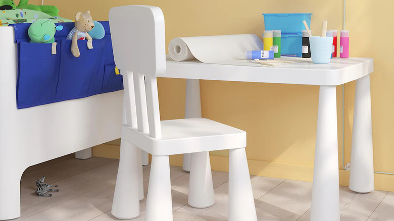 The IKEA MAMMUT table with craft supplies on it