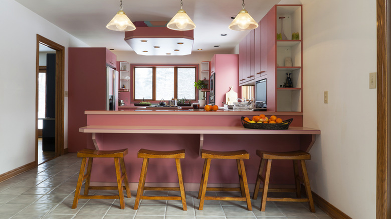 interior shot of a pink kitchen