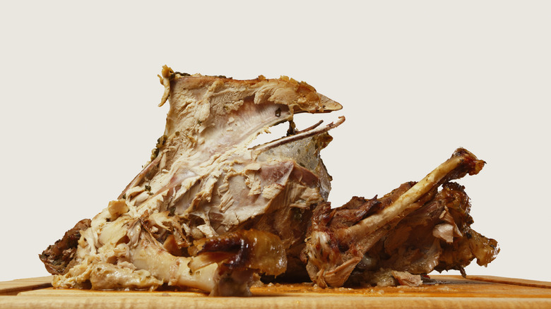 Turkey carcass on a cutting board